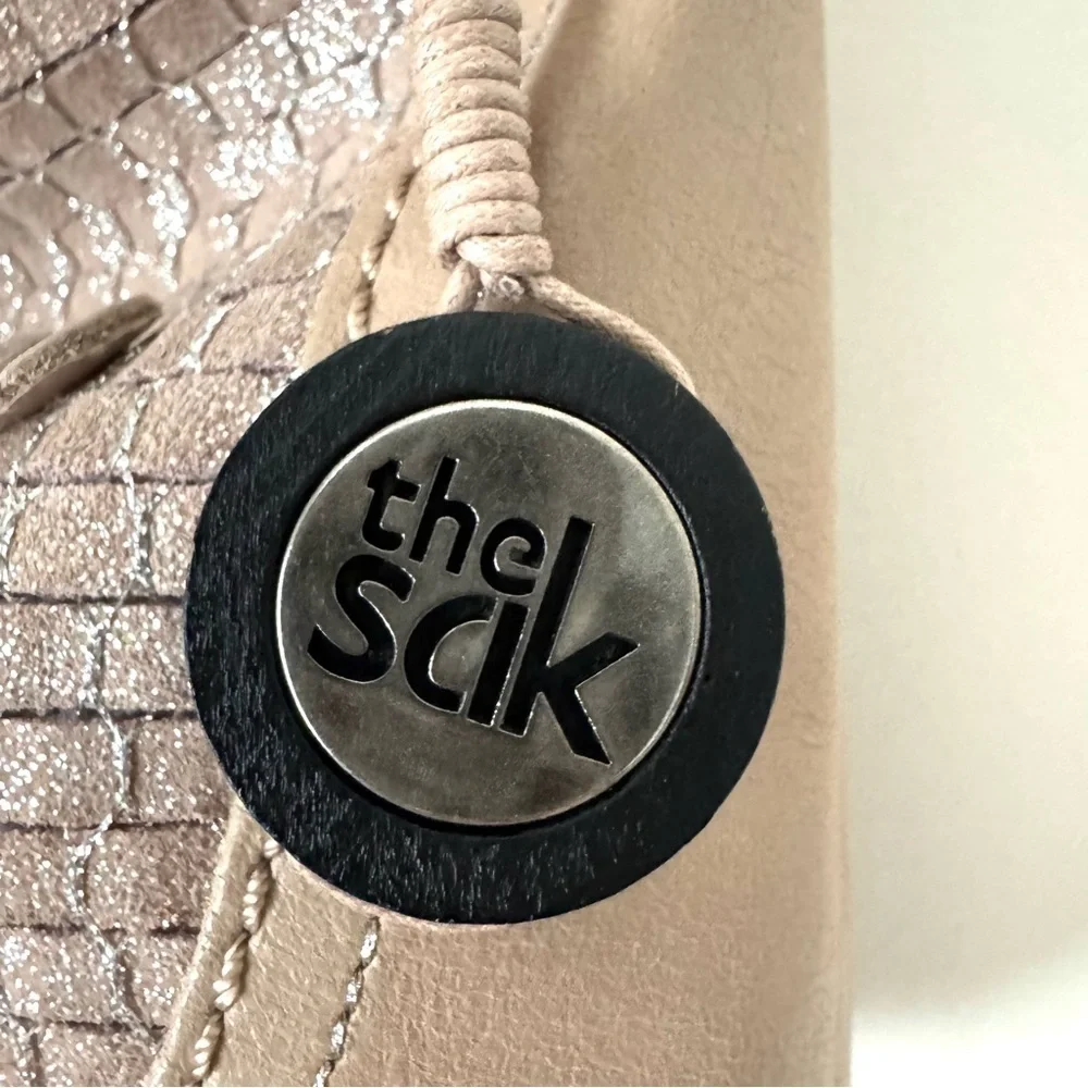 The Sak Tan Indio Leather Shoulder Bag with silver metallic panel